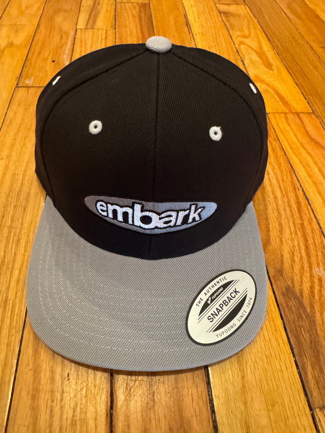 Embark Oval Logo SnapBack Hat in Black/Grey